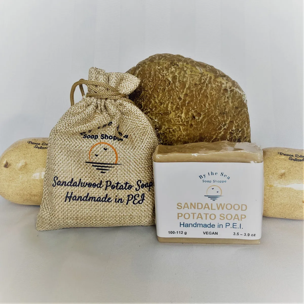 Potato Sandalwood Soap with its potato bag by By the Sea Soap Shoppe