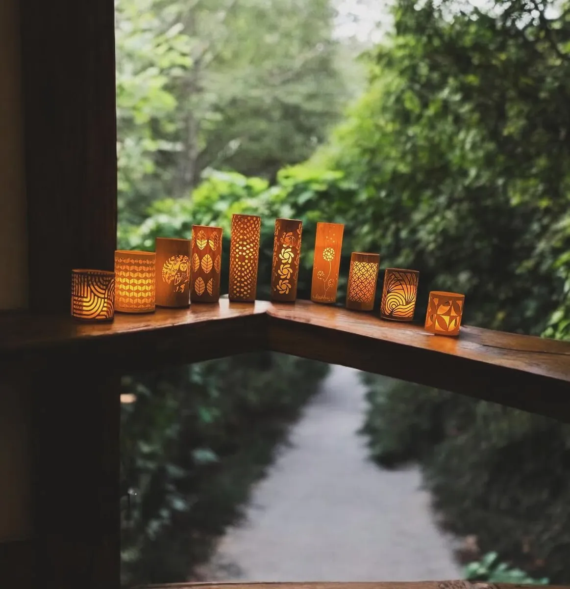 Lanterns on a deck rail by Cottage Creations by Carol