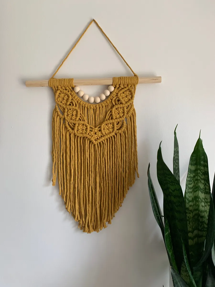 Mustard macramé wall hanging by Island Fibrescapes