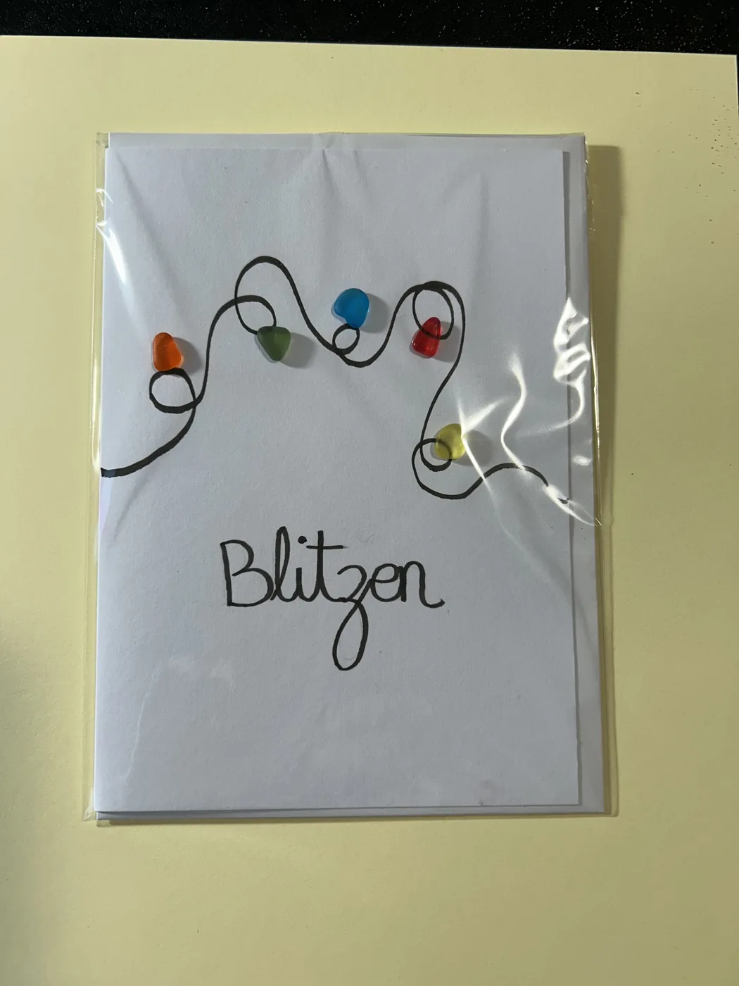 Hand-drawn Blitzen card with sea glass Christmas lights by Joy Designs