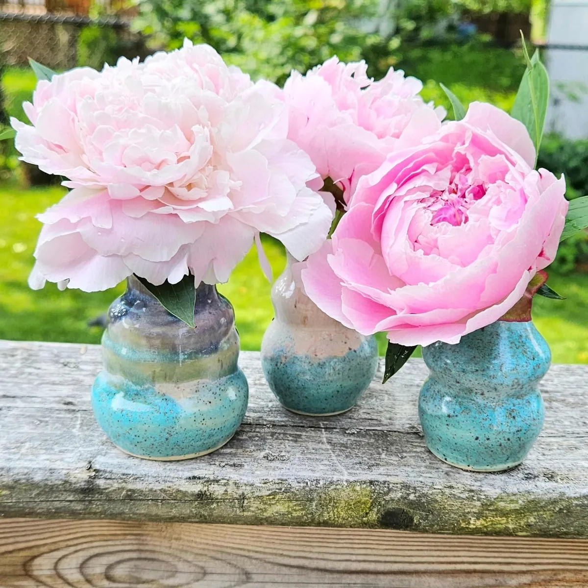 Bud vases with peonies by Lindsay Bromley Pottery