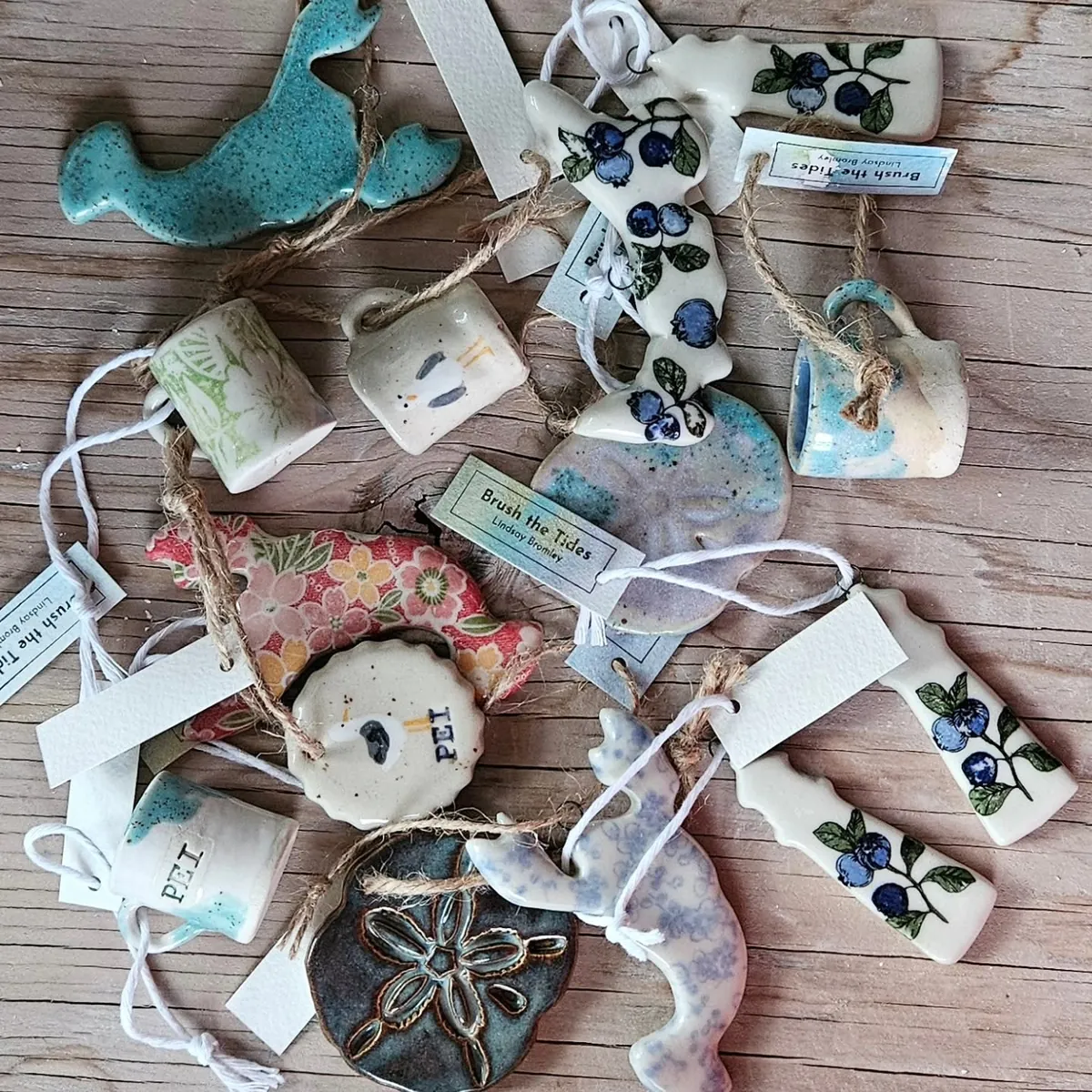 Ornaments with gift tags by Lindsay Bromley Pottery