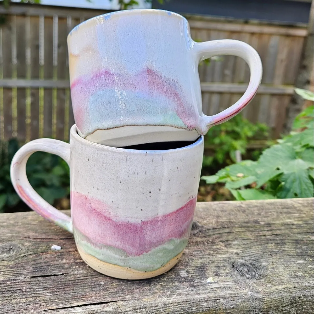 Pink and white mugs by Lindsay Bromley Pottery