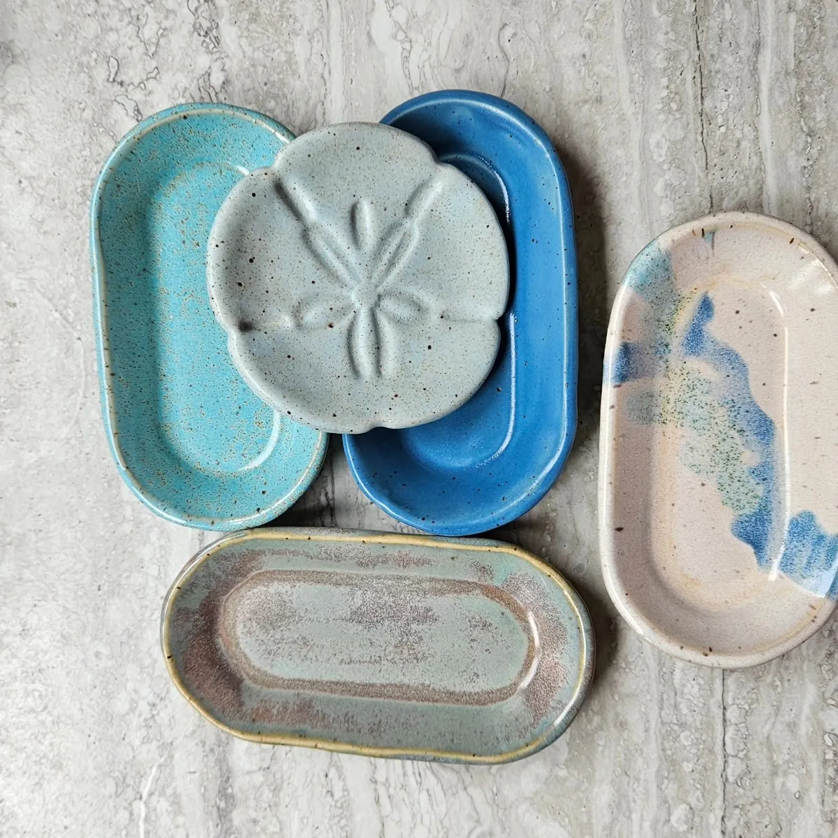 Sand dollar dish and trays by Lindsay Bromley Pottery