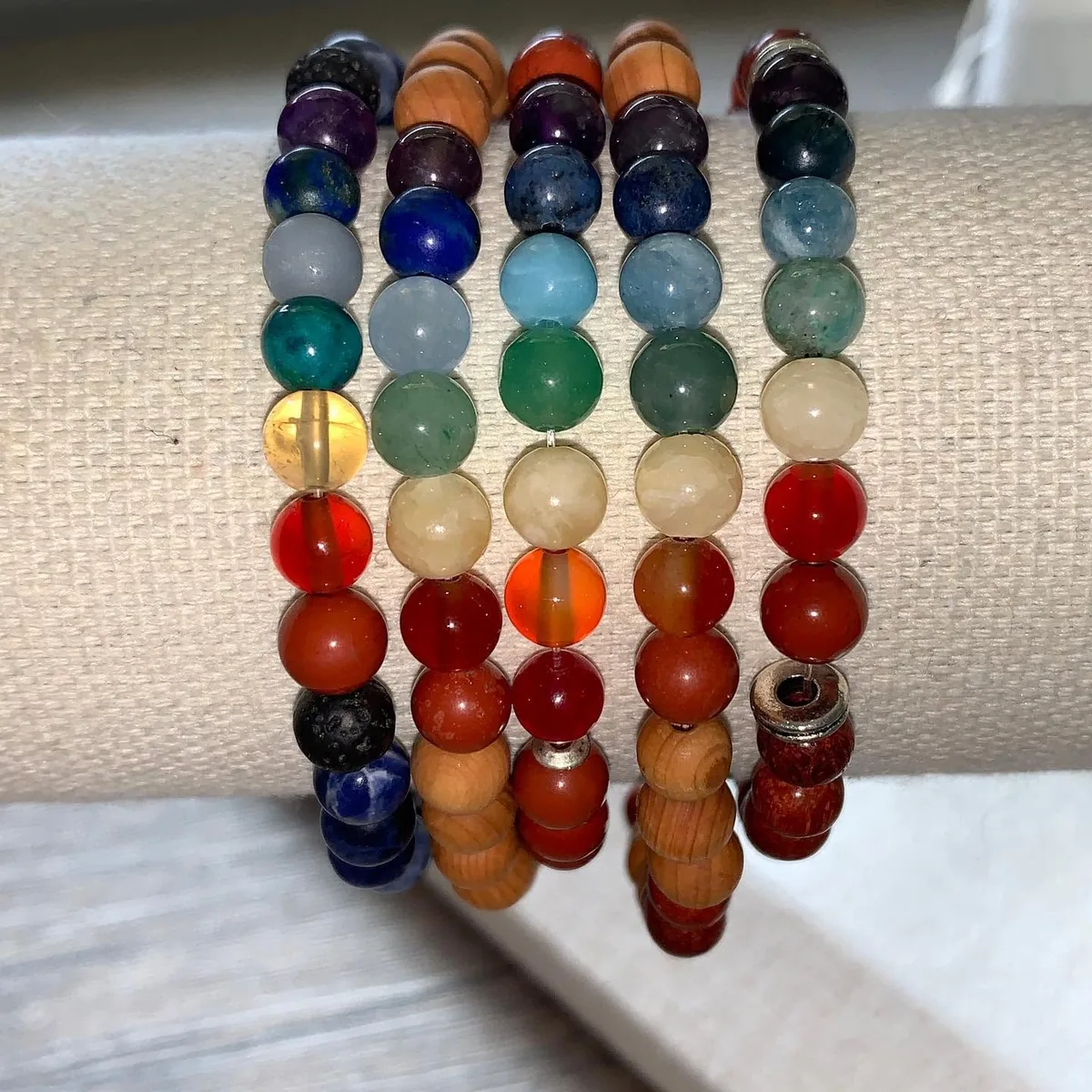 Stacked crystal bead bracelets by Nora Cummins, Energy Intuitive