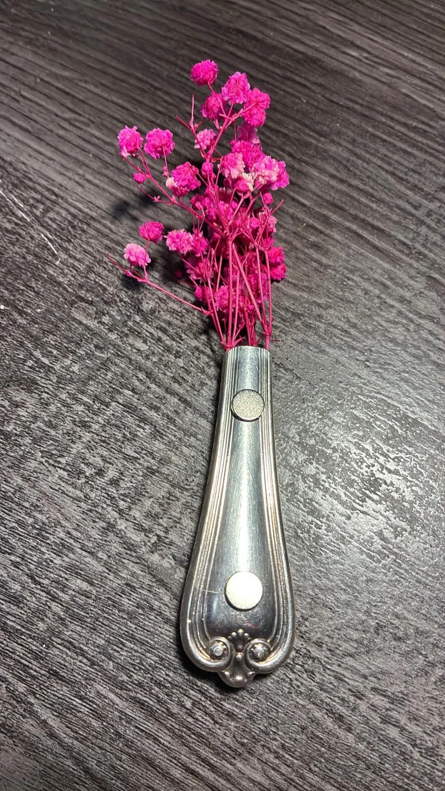 The magnetic back of a vintage spoon bud vase by Vintage Curve