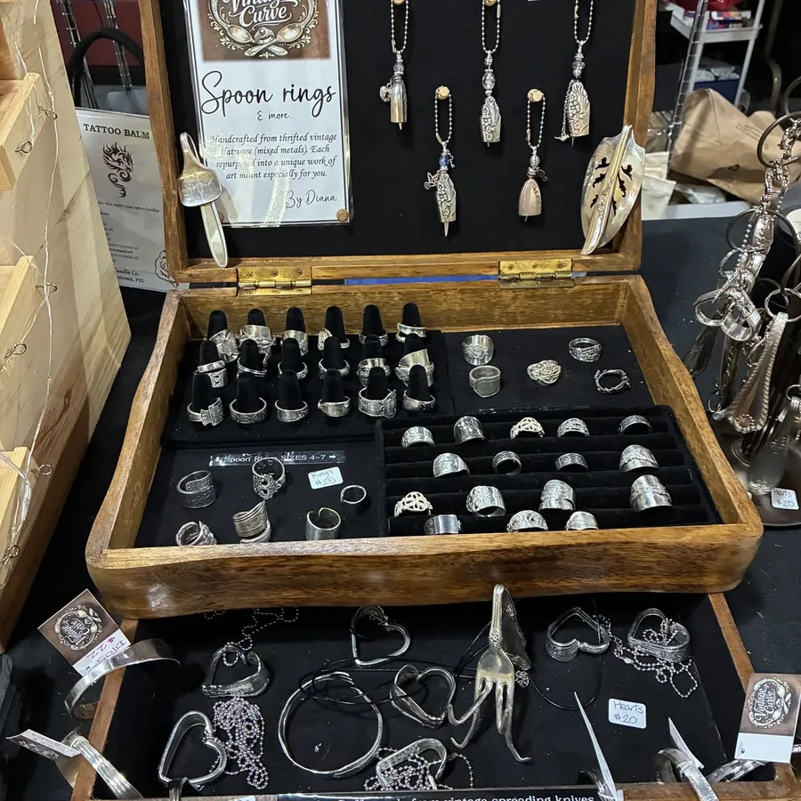 Rings and pendants in a wooden case